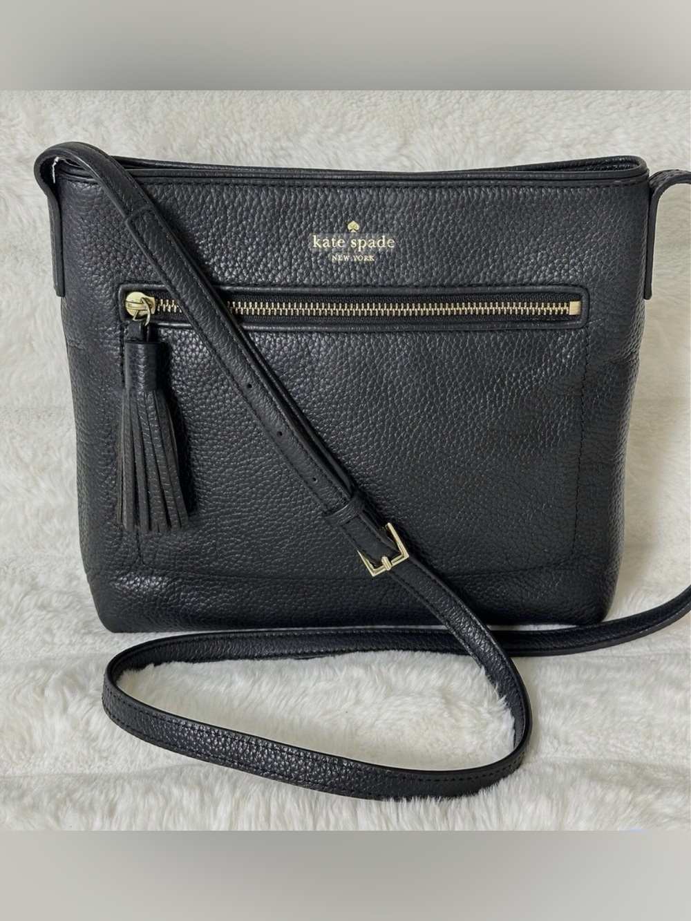 kate spade navy blue Pebbled Leather Tassel Crossbody